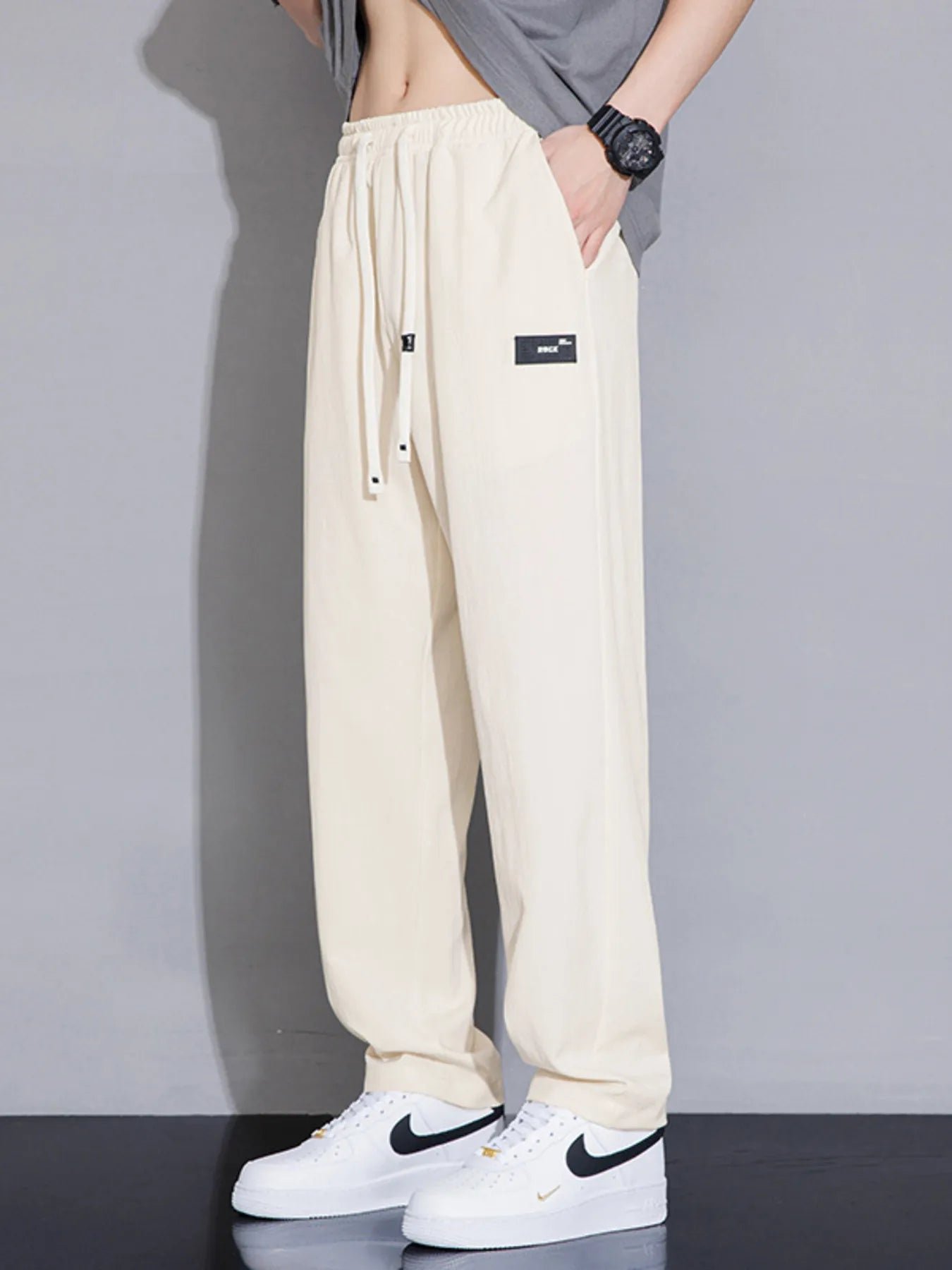 Pantalón holgado con cordón y caída ancha